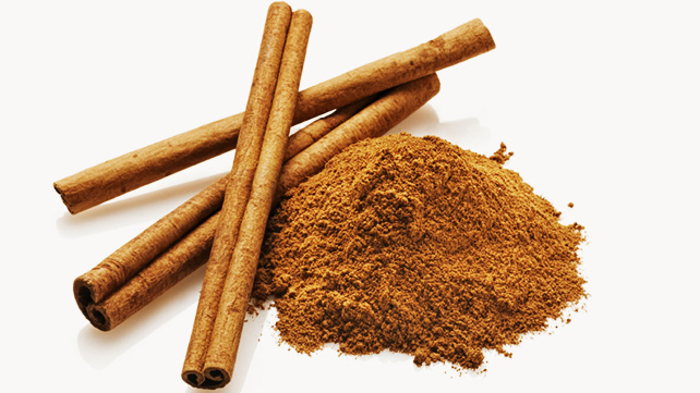 Cinnamon sticks and ground cinnamon powder.